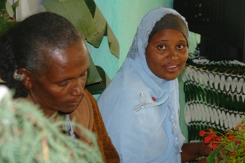 Photo of an Ethiopian woman at Tigray community meeting.